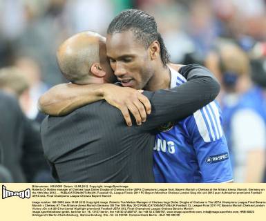 Roberto Di Matteo manager of Chelsea hugs Didier Drogba of Chelsea.in the UEFA Champions League final, Bayern Munich v Chelsea at the Allianz Arena, Munich, Germany on the 19th May 2012. ... EDITORIAL USE ONLY. No use with unauthorised audio, video, data, fixture lists, club league logos or live services. Online in-match use limited to 120 images, no video emulation. No use in betting, games or single club league player publications.
