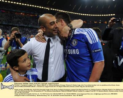 Football - Champions League Final - Bayern Munich vs. Chelsea Chelsea s Manager Roberto Di Matteo hugs John Terry following their win on penalties at the Allianz Arena, Munich 