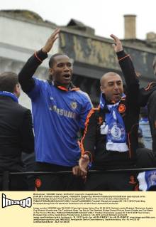 20.05.2012 Chelsea London, England. Champions League Cup Winners Parade atop the traditional open-top bus to the Stamford Bridge Ground. Picture shows Drogba and Di Mateo in the front of the bus xAlanxStanfordx  ActionPlus20239849