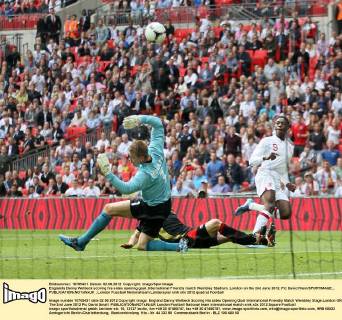 Englands Danny Welbeck scoring his sides opening goal..International Friendly match Wembley Stadium, London on the 2nd June 2012. Pic David Klein SPORTIMAGE... EDITORIAL USE ONLY. No use with unauthorised audio, video, data, fixture lists, club league logos or live services. Online in-match use limited to 120 images, no video emulation. No use in betting, games or single club league player publications.
