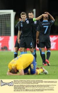 Englands Steven Gerrard celebrates at the final whistle..Euro 2012 Sweden v England, Olympic Stadium, Kiev, 15th June 2012. Pic David Klein SPORTIMAGE... EDITORIAL USE ONLY. No use with unauthorised audio, video, data, fixture lists, club league logos or live services. Online in-match use limited to 120 images, no video emulation. No use in betting, games or single club league player publications.