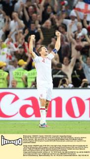 Englands Steven Gerrard celebrates at the final whistle..Euro 2012 England v Ukraine, Donbass Arena, Donetsk, 19th June 2012. Pic David Klein SPORTIMAGE EDITORIAL USE ONLY. No use with unauthorised audio, video, data, fixture lists, club league logos or live services. Online in-match use limited to 120 images, no video emulation. No use in betting, games or single club league player publications.