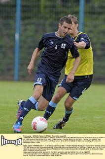 11.07.2012, Fussball Bundesliga Saison 2012 13, Fototermin beim TSV 1860 München an der Grünwalder Strasse, Kai Bülow (re, 1860) versucht Maximilian Nicu (1860) zurückzuhalten