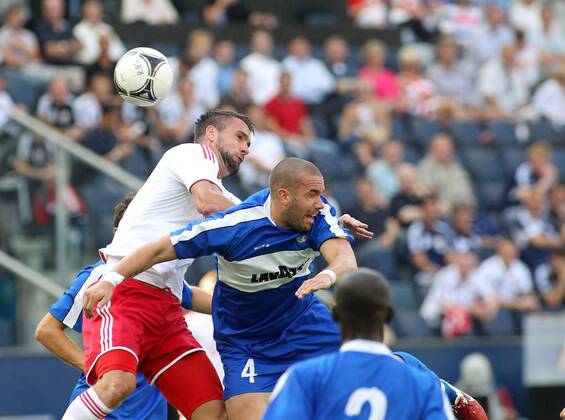 FUSSBALL - CL Quali, RBS vs Dudelange SALZBURG,AUSTRIA,24.JUL.12 - FUSSBALL - UEFA Champions League, Qualifikation, Red Bull Salzburg vs F91 Düdelingen. Bild zeigt Stephan Maierhofer (RBS) und Bryan Melisse (Dudelange). 
