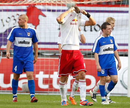 FUSSBALL - CL Quali, RBS vs Dudelange SALZBURG,AUSTRIA,24.JUL.12 - FUSSBALL - UEFA Champions League, Qualifikation, Red Bull Salzburg vs F91 Düdelingen. Bild zeigt Julien Tournut (Dudelange), Stefan Maierhofer (RBS) und Ben Payal (Dudelange). 