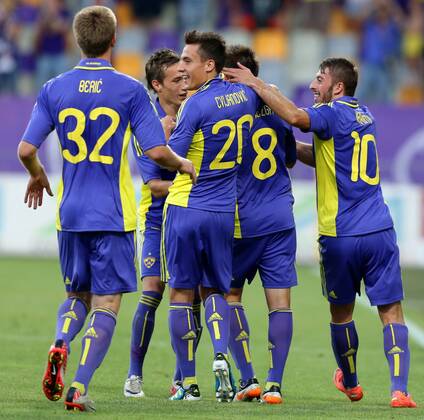 FUSSBALL - CL Quali, Maribor vs Dudelange MARBURG,SLOWENIEN,01.AUG.12 - FUSSBALL - UEFA Champions League, Qualifikation, NK Maribor vs F91 Duedelingen. Bild zeigt den Jubel von Maribor mit Robert Beric, Goran Cvijanovic, Dejan Mezga und Agim Ibraimi (Maribor). 
