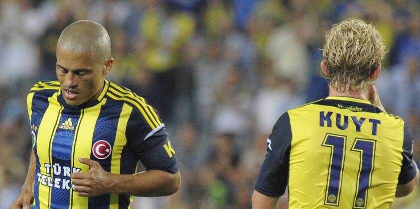 Champions League 3rd qualifying match between Fenerbahce and SC Vaslui at the Sukru Saracoglu Stadium in Istanbul, Turkey on 2012 08 01 Pictured: Alex de Souza and Dirk Kuyt of Fenerbahce. 