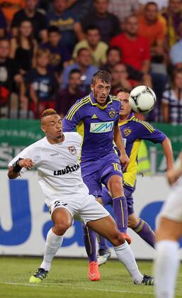 FUSSBALL - CL Quali, Maribor vs Dudelange MARBURG,SLOWENIEN,01.AUG.12 - FUSSBALL - UEFA Champions League, Qualifikation, NK Maribor vs F91 Duedelingen. Bild zeigt Bryan Melisse (Dudelange) und Agim Ibraimi (Maribor). 