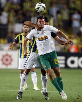 Champions League 3rd qualifying match between Fenerbahce SK Istanbul and FC Vaslui at the Sukru Saracoglu Stadium in Istanbul, on 2012 08 01 Fenerbahce - Vaslui FC 1-1: Egemen Korkmaz of Fenerbahce and Marius Niculae (white) of Vaslui. 