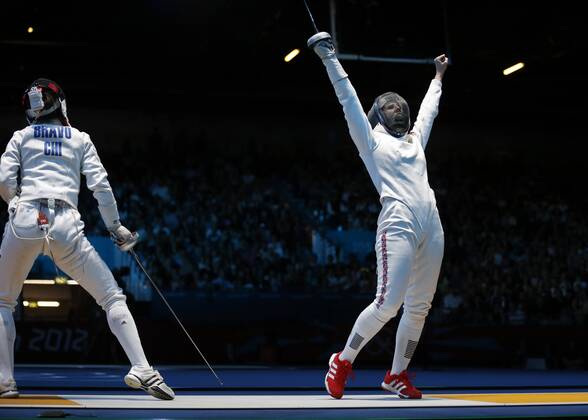July 30, 2012 - London, England, United Kingdom - Great Britain s Corinna Lawrence (right) set up a last-32 contest with European champion Simona Gherman in the women s Epee with a win over Caterin Bravo Aranguiz. (left) .BRIAN PETERSON¢, England - 07 29 2012 Olympics 2012 - London - July 30, 2012 - ZUMAm42