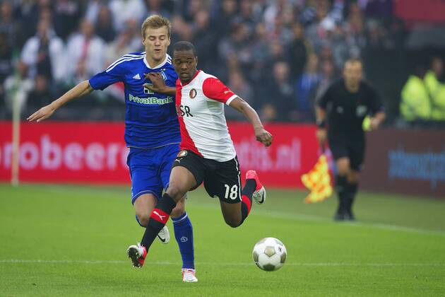 (L-R) Andriy Yarmolenko of Dynamo Kiev,Miquel Nelom of Feyenoord Feyenoord Rotterdam vs Dynamo Kiev. UEFA Champions League Third Round Qualifier 2012 2013 xVIxWillemxJanxDijkdrentxIVx 1079790