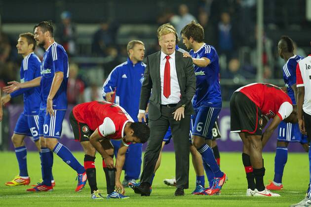 (L-R) Harmeet Singh of Feyenoord,coach Ronald Koeman of Feyenoord,Sekou Cisse of Feyenoord Feyenoord Rotterdam vs Dynamo Kiev. UEFA Champions League Third Round Qualifier 2012 2013 xVIxWillemxJanxDijkdrentxIVx 1079814