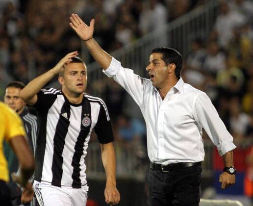 08.08.2012 Belgrade(Serbia) FK Partizan - FC AEL Limassol UEFA Champions League third leg qualify men s football Charalambos Christodolou(r) FC AEL Limassol coach and Nikola Aksentijevic(L) FK Partizan : 