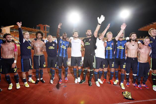Champions League 3rd qualifying match between SC Vaslui and Fenerbahce Istanbul at the Municipal Ceahlaul Stadium in Piatra Neamt, Romania on 2012 08 08 Pictured: Fenerbahce s football players celebrates after the match. 