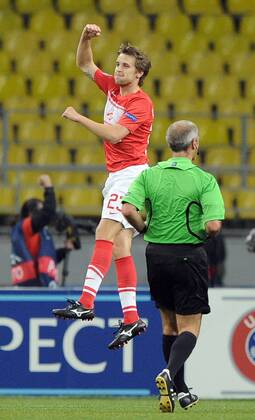 MOSCOW, RUSSIA. AUGUST 21, 2012. Spartak s Kirill Kombarov celebrates a scored goal during a UEFA Champions League group stage match Spartak (Moscow) vs. Fenerbahce S.K.  premiumd RE1065C3