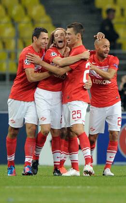 MOSCOW, RUSSIA. AUGUST 21, 2012. Spartak players celebrate a scored goal during a UEFA Champions League group stage match Spartak (Moscow) vs. Fenerbahce S.K.  premiumd RE1065C6