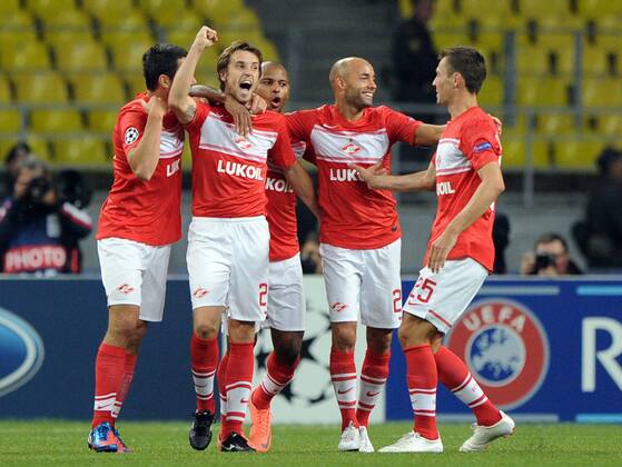 MOSCOW, RUSSIA. AUGUST 21, 2012. Spartak players celebrate a scored goal during a UEFA Champions League group stage match Spartak (Moscow) vs. Fenerbahce S.K.  premiumd RE1065C7