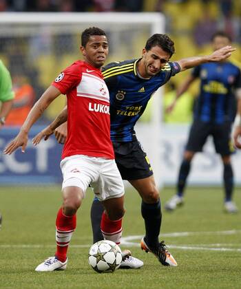 Champions League qualifying match between Spartak Moscow and Fenerbahce Istanbul at Luzhniki Stadium in Moscow, Russia on 2012 08 21 Pictured: Mehmet Topal (R) of Fenerbahce and Rafael de Souza Pereira Carioca (L) of Spartak Moscow. 