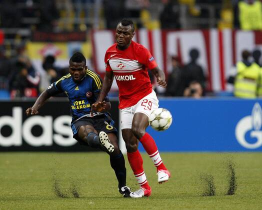 Champions League qualifying match between Spartak Moscow and Fenerbahce Istanbul at Luzhniki Stadium in Moscow, Russia on 2012 08 21 Pictured: Joseph Yobo (L) of Fenerbahce and Emmanuel Emenike (R) of Fenerbahce. 