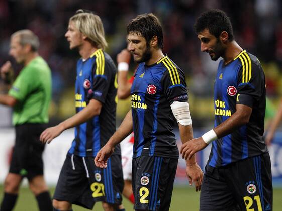 Champions League qualifying match between Spartak Moscow and Fenerbahce Istanbul at Luzhniki Stadium in Moscow, Russia on 2012 08 21 Match Scored: Spartak Moscow 2 - Fenerbahce 1 Pictured: Milos Krasic (L), Egemen Korkmaz (C) and Selcuk Sahin (R) of Fenerbahce. 