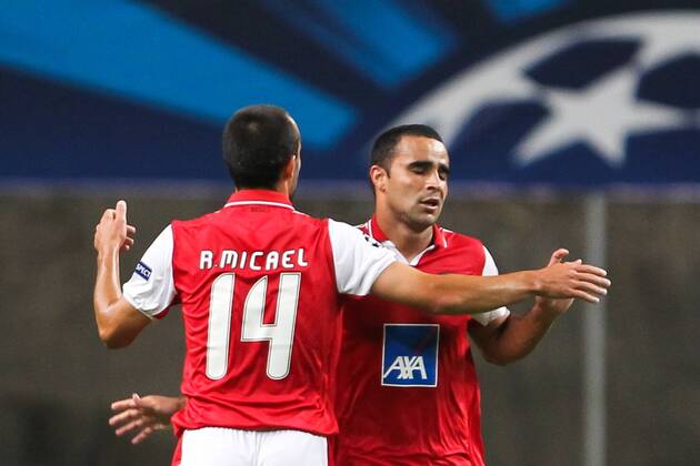 Ismaily (R) celebrates his goal for SC Braga against Udinese Calcio during their UEFA Champions League Play-off First Leg, SC Sporting Braga - Udinese Calcio 