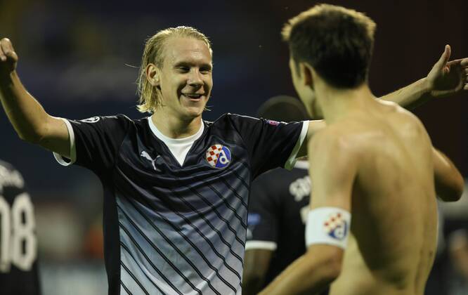 Zagreb, 22.08.2012. - Play-off round 1st leg - Stadion Maksimir, GNK Dinamo (blue) - NK Maribor (yellow) 1:2 Domagoj vida and Milan Badelj