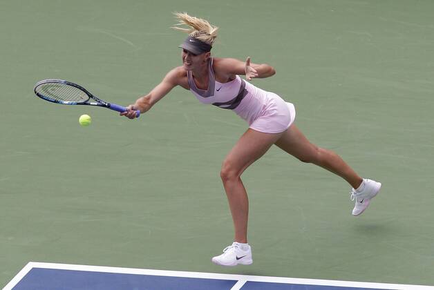 Maria Sharapova (RUS) hits a forehand in first round match at the 2012 U.S. Open Tennis Championships in Arthur Ashe Stadium at the Billie Jean King National Tennis Center in New York City on August 27, 2012.  NYP20120827102