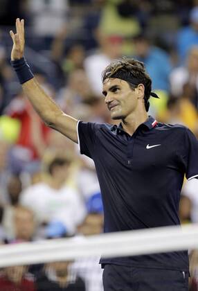 Roger Federer of Switzerland reacts after match point in his first round match at the 2012 U.S. Open Tennis Championships in Arthur Ashe Stadium at the Billie Jean King National Tennis Center in New York City on August 27, 2012.  NYP20120827135