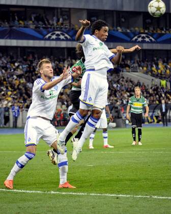 FC Dynamo Kyiv players Andriy Yarmolenko (L) and Betao control the ball during the UEFA Champions League play-off round second-leg match with VfL Borussia Mönchengladbach at the National Complex Olimpiyskiy, Kyiv, capital of Ukraine, August 29, 2012. UKRINFORM. 