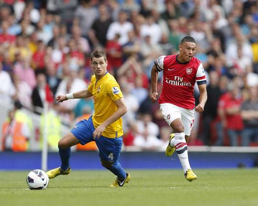Arsenal s Alex Oxlade-Chamberlain goes past Southampton s Morgan Schneiderlin.. Football - Barclays Premier League. Arsenal FC London - Southampton FC. Emirates Stadium - 15 9 12 EDITORIAL USE ONLY. No use with unauthorised audio, video, data, fixture lists, club league logos or live services. Online in-match use limited to 120 images, no video emulation. No use in betting, games or single club league player publications.