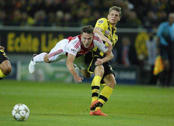 Lukasz PISZCZEK Nr. 26 BVB im Zweikampf , Aktion um den Ball gegen DERK BOERRIGTER BORUSSIA DORMUND - AJAX AMSTERDAM Fussball UEFA Champions League, Gruppenphase, BVB, Dortmund, 18.09.2012 CL Saison 2012 2013
