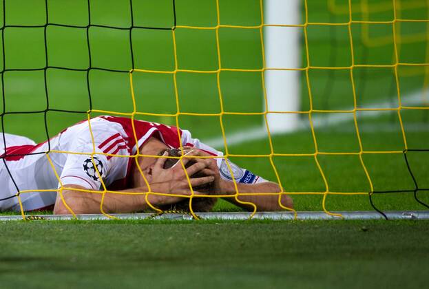 Niklas MOISANDER (AMS) liegt mit Schmerzen am Boden. Fussball international - UEFA Championsleague Saison 2012 2013, Gruppenphase: Borussia Dortmund - Ajax Amsterdam in Dortmund, Deutschland am 18.09.2012,