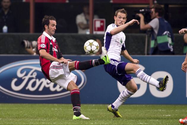 Giampaolo Pazzini (Milan), Olivier Deschacht (Anderlecht), SEPTEMBER 18, 2012 - Football Soccer : UEFA Champions League Group C match between Milan 0-0 RSC Anderlecht at Giuseppe Meazza Stadium (San Siro) in Milano, Italy.  ( ptmb033832)