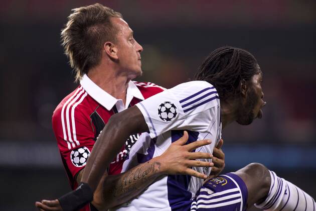 Philippe Mexes (Milan), Dieumerci Mbokani (Anderlecht), SEPTEMBER 18, 2012 - Football Soccer : UEFA Champions League Group C match between Milan 0-0 RSC Anderlecht at Giuseppe Meazza Stadium (San Siro) in Milano, Italy.  ( ptmb033836)