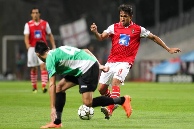Marcio Mossoro (R) of SC Braga challenges Camora of CFR Cluj during the UEFA Champions League, Group H, match against CFR Cluj at AXa Stadium in Braga. 