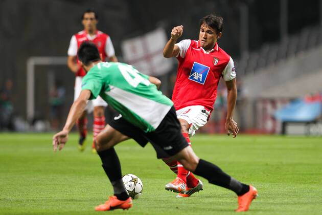 Marcio Mossoro (R) of SC Braga challenges Camora of CFR Cluj during the UEFA Champions League, Group H, match against CFR Cluj at AXa Stadium in Braga. 