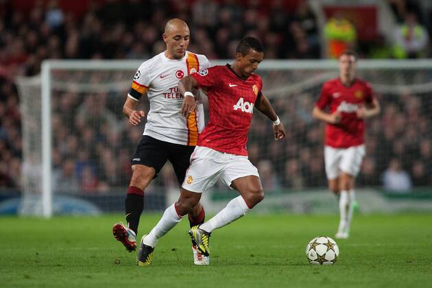 Football - Champions League - Manchester United vs. Galatasaray AS Nordin Amrabat of Galatasaray and Nani of Manchester United at Old Trafford 