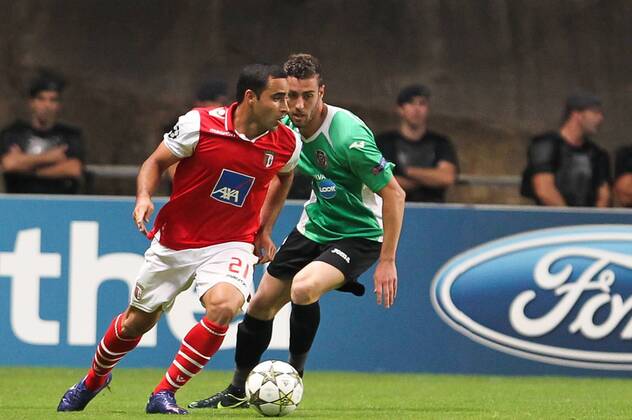 Ismaily (L) of SC Braga challenges Ivo Pinto (R) of CFR Cluj during the UEFA Champions League, Group H, match against CFR Cluj at AXa Stadium in Braga. 