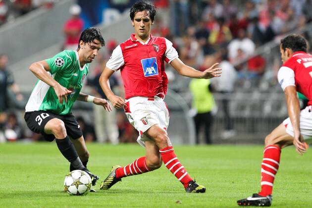 Rui Pedro (L) of CFR Cluj challenges Custodio (R) of SC Braga during the UEFA Champions League, Group H, match against SC Braga at AXa Stadium in Braga. 