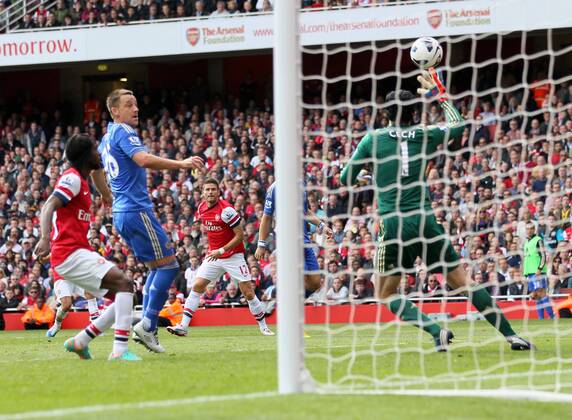 Arsenal s Olivier Giroud sees his shot saved superbly by Chelsea s Petr Cech..Football - Barclays Premier League - Arsenal FC London vs Chelsea FC London - Emirates Stadium - 29 9 12 EDITORIAL USE ONLY. No use with unauthorised audio, video, data, fixture lists, club league logos or live services. Online in-match use limited to 120 images, no video emulation. No use in betting, games or single club league player publications.