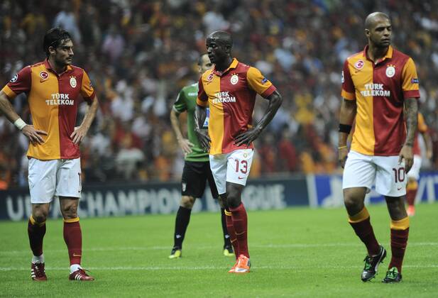 UEFA Champions league group H soccer match between Galatasaray v Sporting SC Braga at Turk Telekom Arena Stadium in Istanbul, Turkey. 02.10.2012 Pictured: Albert Riera (L) and Dany Nounkeu (C) and Felipe Melo (R) of Galatasaray. 