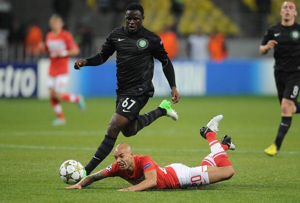 ITAR-TASS: MOSCOW, RUSSIA. OCTOBER 2, 2012. Spartak Moscow s Demy de Zeeuw (in red) and Celtic s Victor Wanyama in action in their UEFA Champions League Group G football match at Luzhniki Stadium.  premiumd RE109CD9