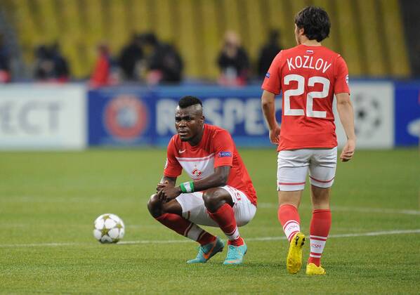 ITAR-TASS: MOSCOW, RUSSIA. OCTOBER 2, 2012. Spartak Moscow s Emmanuel Emenike and Alexander Kozlov (22) react after conceding a goal to Celtic F.C. in their UEFA Champions League Group G football match at Luzhniki Stadium. Celtic F.C. won the game 2-3.  premiumd RE109CE3