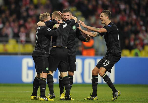 ITAR-TASS: MOSCOW, RUSSIA. OCTOBER 2, 2012. Celtic players celebrate a goal against Spartak Moscow in their UEFA Champions League Group G football match at Luzhniki Stadium. Celtic F.C. won the game 2-3. Right: Mikael Lustig. Centre: Scott Brown.  premiumd RE109CE6