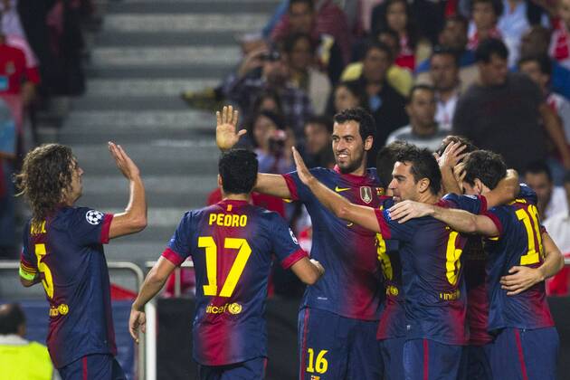 2 October 2012 - Lisbon, Portugal - Barcelona team celebrating their second goal during the UEFA Champions League soccer match between SL Benfica and FC Barcelona for group stage - group D, at SL Benfica, Luz stadium in Lisbon. 