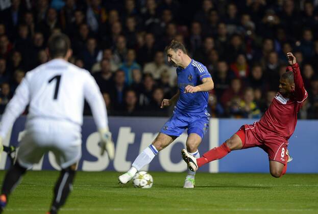 02-10-2012: Champions League, FC Nordsjaelland (FCN) - Chelsea FC:Branislav Ivanovic, Chelsea FC., Patrick Mtiliga, FC Nordsjaelland FCN. 