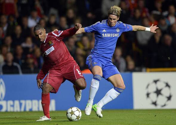 02-10-2012: Champions League, FC Nordsjaelland (FCN) - Chelsea FC: Patrick Mtiliga, FC Nordsjaelland FCN., Fernando Torres, Chelsea FC. 