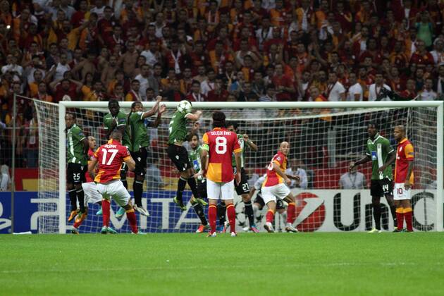 Burak Yilmaz of Galatasaray use free kick against SC Sporting Braga during UEFA Champions League Group H matcah between Galatasaray and SC Sporting Braga played at Turk Telekom Arena Ali Sami Yen Sports Complex in Istanbul. Turkey 02.10.2012 