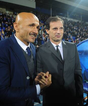 ITAR-TASS: ST PETERSBURG, RUSSIA. OCTOBER 3, 2012. Zenit s head coach Luciano Spalletti (L) and Milan s head coach Massimiliano Allegri watch action in a UEFA Champions League Group C football match between Zenit St Petersburg and A.C. Milan at Petrovsky Stadium. A.C. Milan won the game 2-3.  RE109E3F