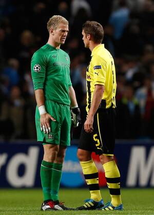 Manchester City s Joe Hart (L) and Borussia Dortmund s Sebastian Kehl have words at full time..Champions League football match between Manchester City and Borussia Dortmund at the Etihad Stadium, Manchester on the 3rd October 2012 EDITORIAL USE ONLY. No use with unauthorised audio, video, data, fixture lists, club league logos or live services. Online in-match use limited to 120 images, no video emulation. No use in betting, games or single club league player publications.